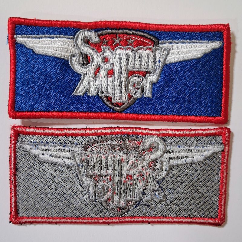 woven museum badge